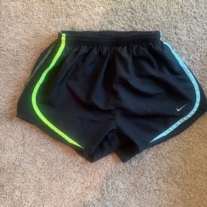 Size medium. Nike shorts. Lined. Black with multi colored stripes